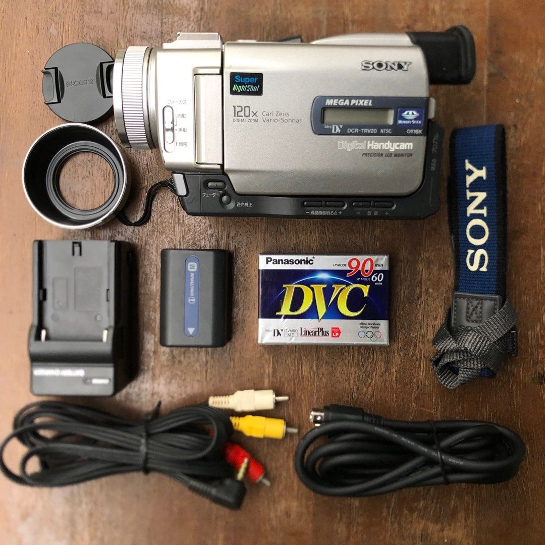 SONY DCR-TRV20 Mini DV Camcorder (1998) (Category: Video Cameras) located in Makati City. Submitted by maka-luma (Listing ID 1304217245, Image 3). Description: FULLY WORKING ✔️ Record ✔️ 120x Servo Zoom ✔️ Powerful Night Vision ✔️ Rewind ✔️ Pause/Stop ✔️ Fast forward ✔️ Color Viewfinder ✔️ Color LCD ✔️ Program AE ✔️ Tape eject ✔️ Diverse settings ✨Mint Condition ✨ ₱7,999 READY TO USE! 📹📼🔋Inclusions: Camera unit, Sony camera shoulder strap, Son