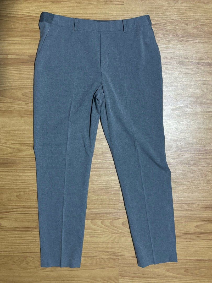 UNIQLO Gray Stretchable Office Pants (Category: Other Bottoms) located in Quezon City. Submitted by cptsp (Listing ID 1304201841, Image 1). Description: *COLOR IS GRAY SEE LAST 2 PICS* UNIQLO Stretchable Office Pants L Waist 30-31” 27” Length Like new, no tags.