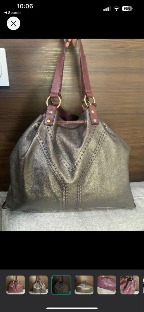 YSL Reversible Bag (Category: Luxury Bags & Wallets) located in Manila. Submitted by cheemishops (Listing ID 1304166887, Image 3). Description: YSL Reversible Bag Authentic Gold and Maroon.