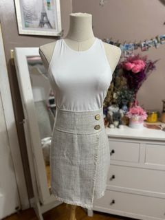 Beige linen mini skirt with cute button accent