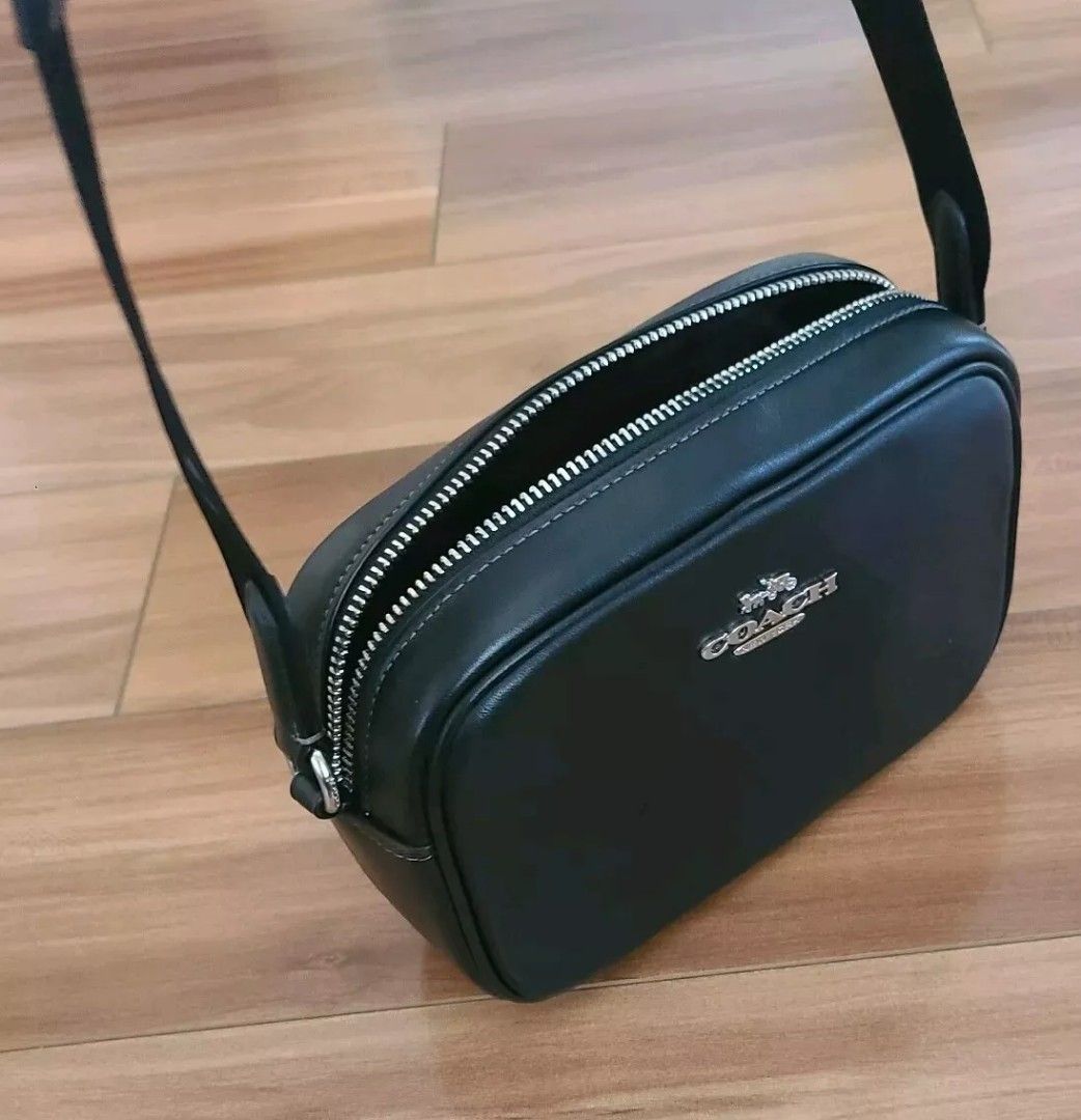 Coach Mini Jamie Camera Bag (Category: Cross-body Bags) located in Manila. Submitted by stacey_lopez922 (Listing ID 1301207794, Image 3). Description: Coach Mini Jamie Camera Bag (With dustbag and paperbag) - 7 3/4" (L) x 5" (H) x 2 1/2" (W) - Refined calf leather - Two credit card slots - Inside multifunction pocket - Zip closure, fabric lining - Outside open pocket - Adjustable strap with 24" drop for shoulder or crossbody wear.
