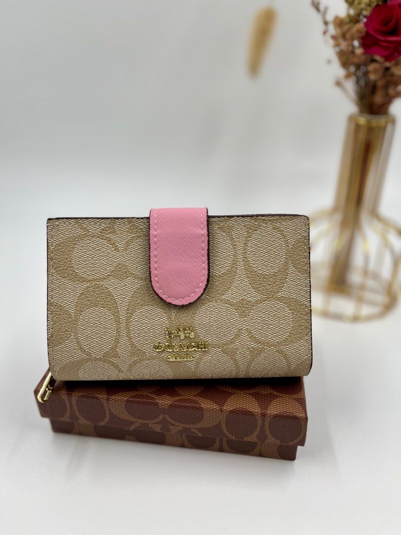 Coach pink different rose wallet