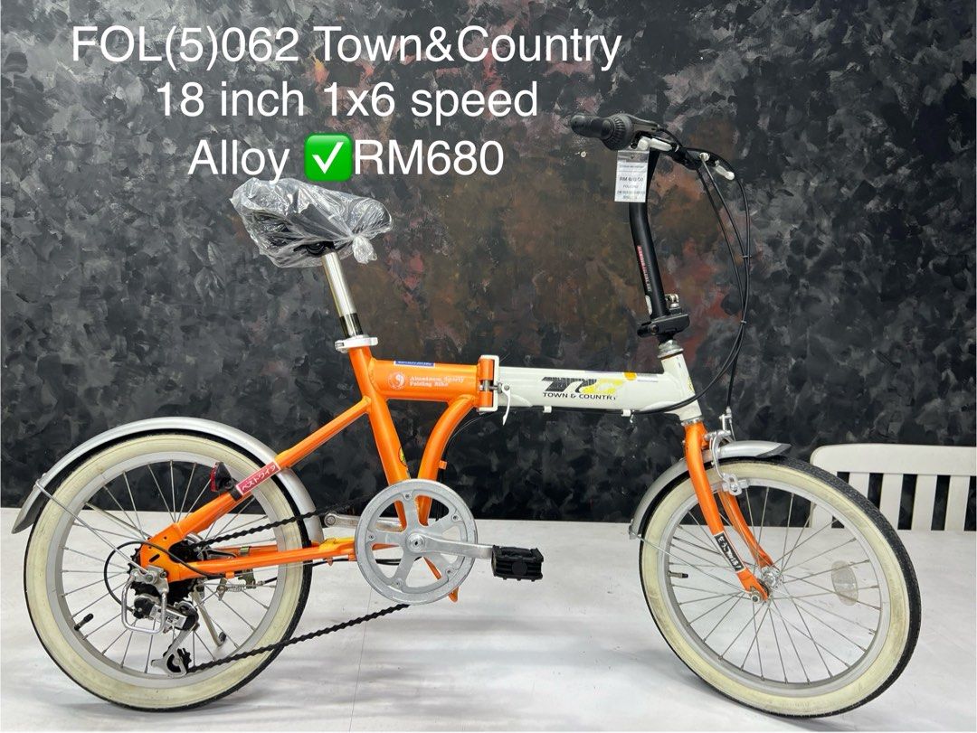 Town and country folding bike top