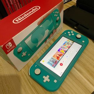 Nintendo Switch Games Lite (Turquoise) Complete with Box, Freebies, and 14 Digital Games