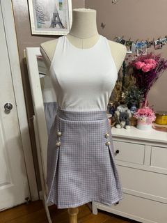 Pastel plaid mini skirt with pearl buttons