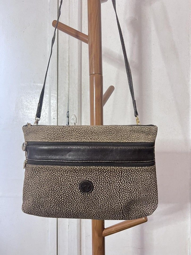 Peruzzi Firenze Moda Borbonese Bag with Purse Italy (Category: Luxury Bags & Wallets) located in Quezon City. Submitted by nnncorner (Listing ID 1301269459, Image 2). Description: Peruzzi Firenze Moda Borbonese Italy Bag Original can be used as sling bag/clutch bag detachable sling coin purse included 2,000 9/10 condition.