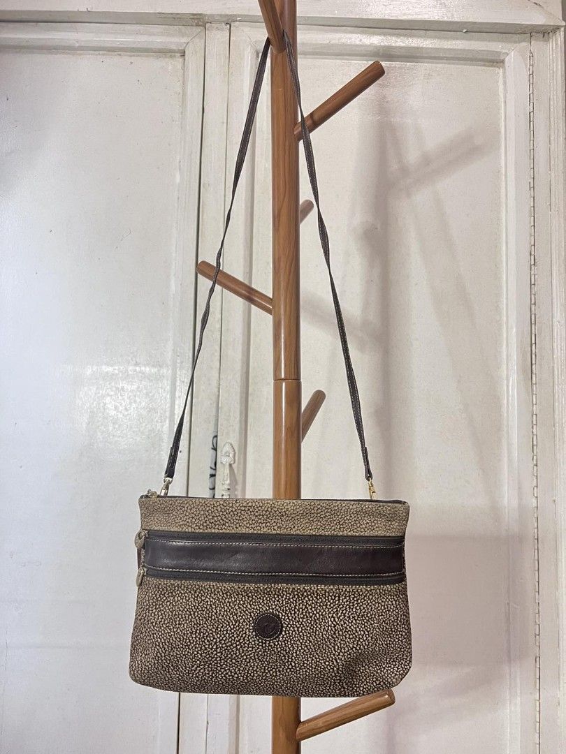 Peruzzi Firenze Moda Borbonese Bag with Purse Italy (Category: Luxury Bags & Wallets) located in Quezon City. Submitted by nnncorner (Listing ID 1301269459, Image 1). Description: Peruzzi Firenze Moda Borbonese Italy Bag Original can be used as sling bag/clutch bag detachable sling coin purse included 2,000 9/10 condition.