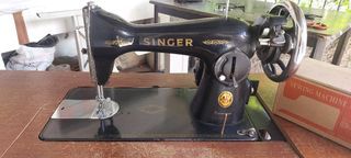 Singer Ordinary Sewing Machine. With Original Cabinet and Stand. With Motor and Foot control. Top working Condition. Original Singer Brand.