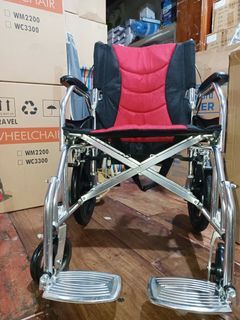 Travel wheelchair sureguard red