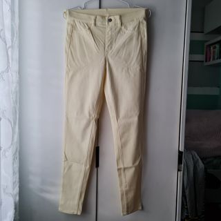 UNIQLO jeggings skinny jeans pastel yellow