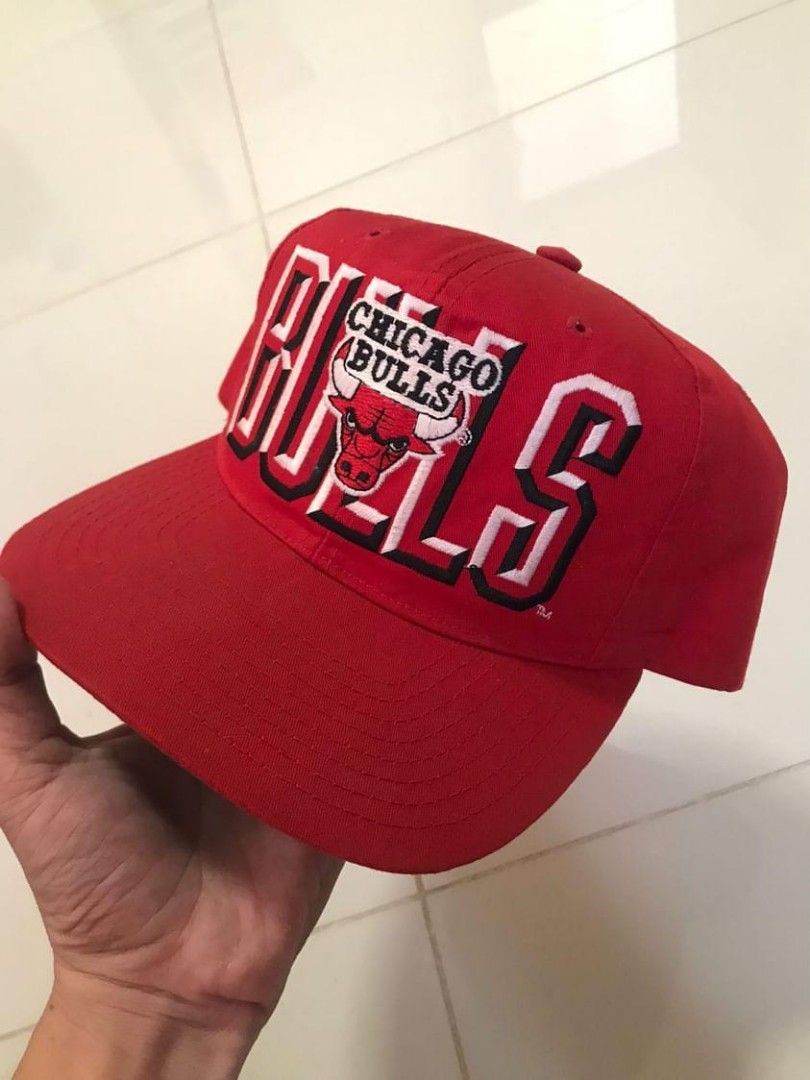 Vintage big logo bulls cap (Category: Activewear) located in Cebu City. Submitted by underrated2000 (Listing ID 1301228185, Image 1). Description: V cap Chicago bulls big logo tag: ADJ Good condition pa change snap yung tag nya pa fade na color rate: 9.8 - 10 adult size 2k + ship.