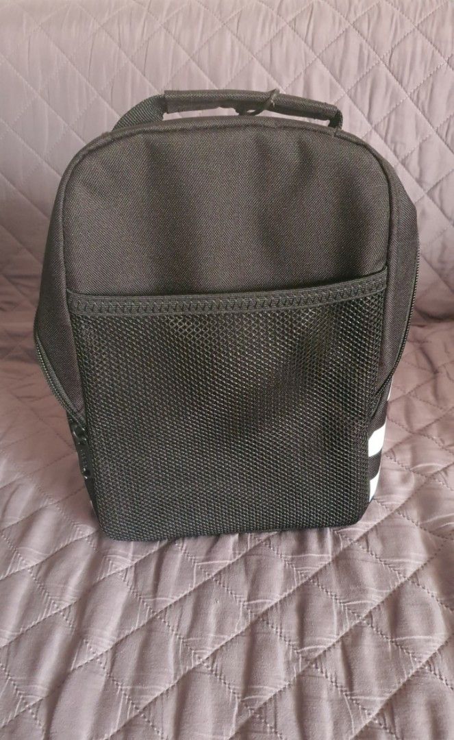 Adidas Santiago Lunch bag (Category: Belt bags, Clutches and Pouches) located in Paranaque City. Submitted by silverbmr (Listing ID 1304319357, Image 2). Description: Adidas Santiago Lunch bag -can fit small mineral bottle or 3 softdrinks cans -brand new -2 on hand P1300 each Shipping c/o buyer.