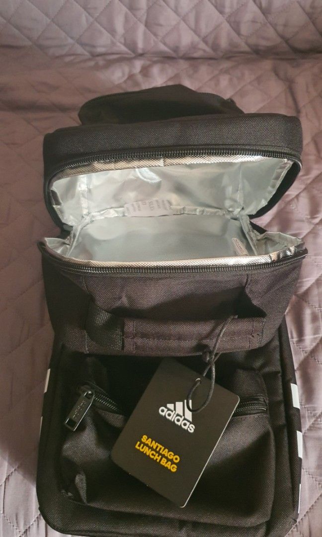 Adidas Santiago Lunch bag (Category: Belt bags, Clutches and Pouches) located in Paranaque City. Submitted by silverbmr (Listing ID 1304319357, Image 3). Description: Adidas Santiago Lunch bag -can fit small mineral bottle or 3 softdrinks cans -brand new -2 on hand P1300 each Shipping c/o buyer.