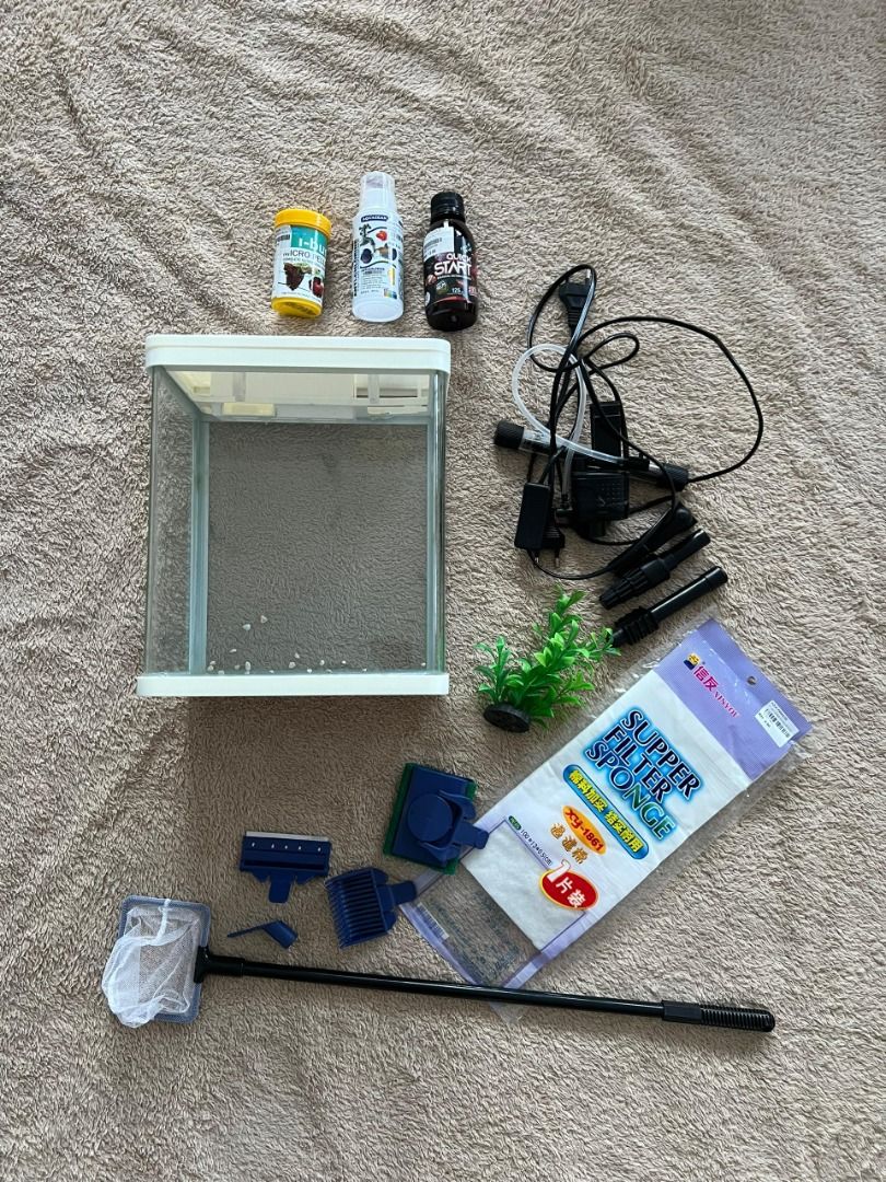 Aquarium set (Category: Homes & Other Pet Accessories) located in Subang Jaya. Submitted by prettaypie (Listing ID 1304385708, Image 2). Description: Aquarium set, comes with fish pellet, quickstart, fish meds, filter, water pump (for oxygen), filter sponge, cleaning tools, fake plants, etc. Will attach instructions and guidance if you need. All necessary items for fish. Condition as shown in picture. .