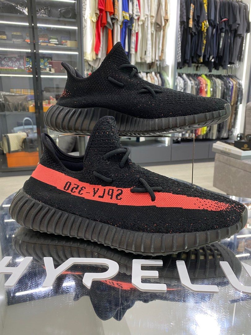 Yeezy black red stripe 2025
