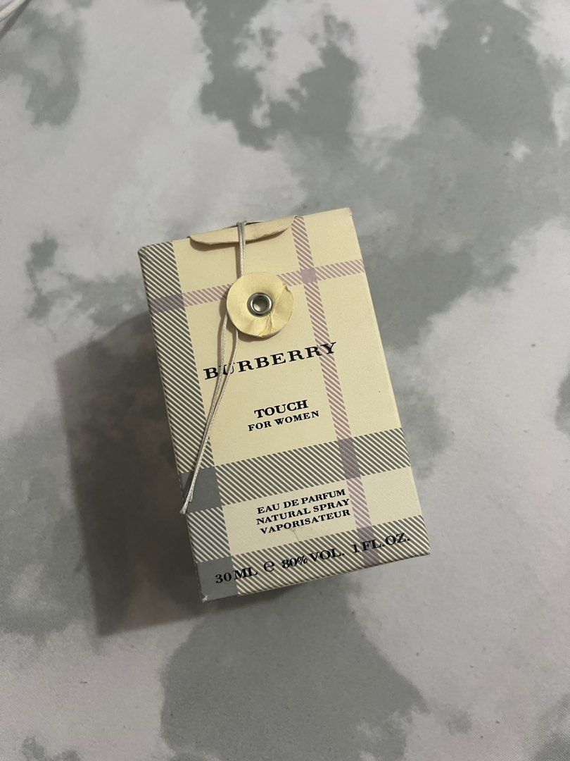 Burberry touch perfume women Eau Fe Parfum (Category: Fragrance & Deodorants) located in Paranaque City. Submitted by coffeejinniee (Listing ID 1304329743, Image 2). Description: Original Eau de Parfum Burberry touch for women. Top notes are Red Pepper, Cassia, Blackberry, Cranberry, Black Currant, Rose Oil and Orange; middle notes are Lily, Peony, Peach, Tuberose, Lily-of-the-Valley, Jasmine and Raspberry; base notes are Cedar, Oakmoss, Vanilla,