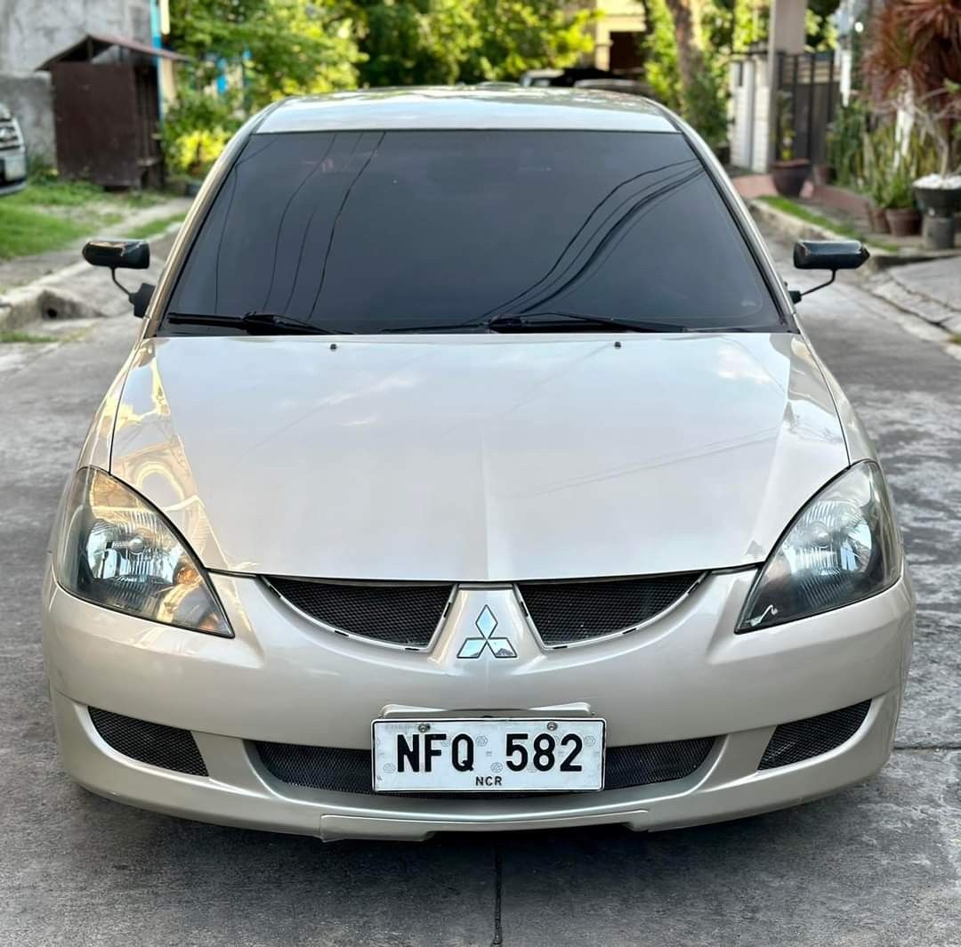 Mitsubishi Lancer 1.6 GLX Exclusive (M) (Category: Used Cars) located in Lucena. Submitted by declutterbyedi (Listing ID 1304296407, Image 1). Description: 2009 Mitsubishi lancer cedia no issue ready for long drive.