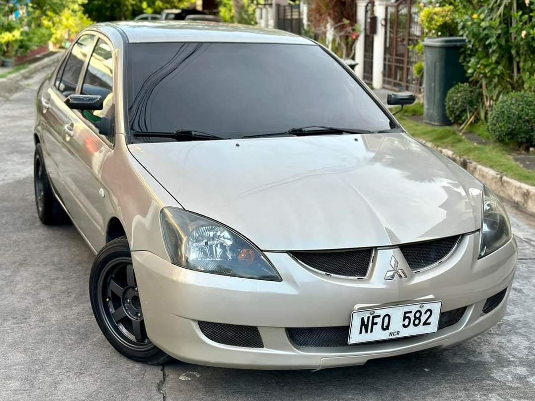 Mitsubishi Lancer 1.6 GLX Exclusive (M) (Category: Used Cars) located in Lucena. Submitted by declutterbyedi (Listing ID 1304296407, Image 2). Description: 2009 Mitsubishi lancer cedia no issue ready for long drive.