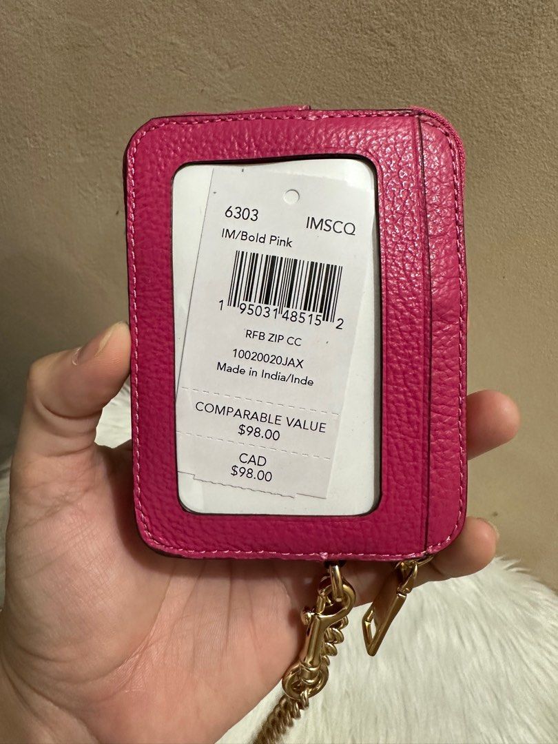 Original Coach Zip Card Case in Bold Pink (Category: Luxury Bags & Wallets) located in Las Pinas. Submitted by anasonlineshophtplaspinas (Listing ID 1304397201, Image 3). Description: Original Coach Zip Card Case in Bold Pink Refined pebble leather| Two credit card slots| ID window| Open pockets| Zip compartment| Chain wrist strap with dogleash clip attached| 3” (L) x 4 1/4” (H) x 3/4” (W).
