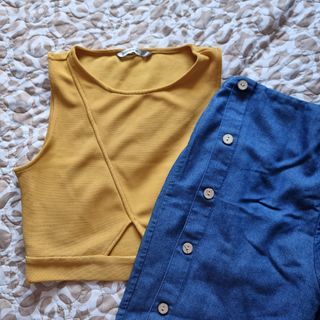 Stradivarius yellow crop top with triangle window & Blue flared pants