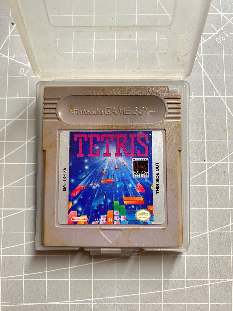 Tetris Gameboy DMG Game (Category: Nintendo) located in Quezon City. Submitted by retroatticshop (Listing ID 1304321770, Image 1). Description: - Authentic - Cartridge only - Tested and in good working condition SF is shouldered by the buyer MOP: Gcash MOD: Lalamove / Gogo Express .