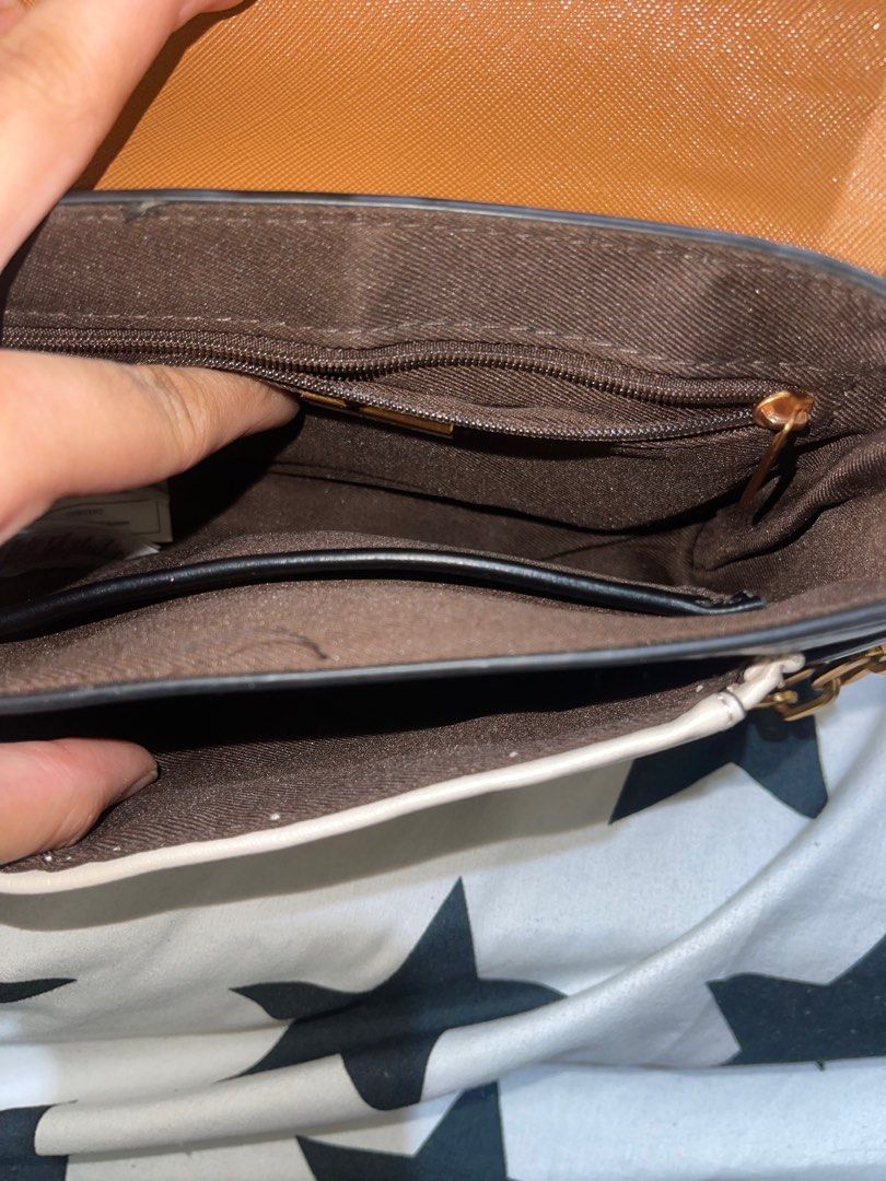 Aldo cross body bag (Category: Cross-body Bags) located in Manila. Submitted by declutterxvictoria (Listing ID 1304569787, Image 3). Description: Barely used Damages: - natanggal ung paint sa lock (barely noticeable).