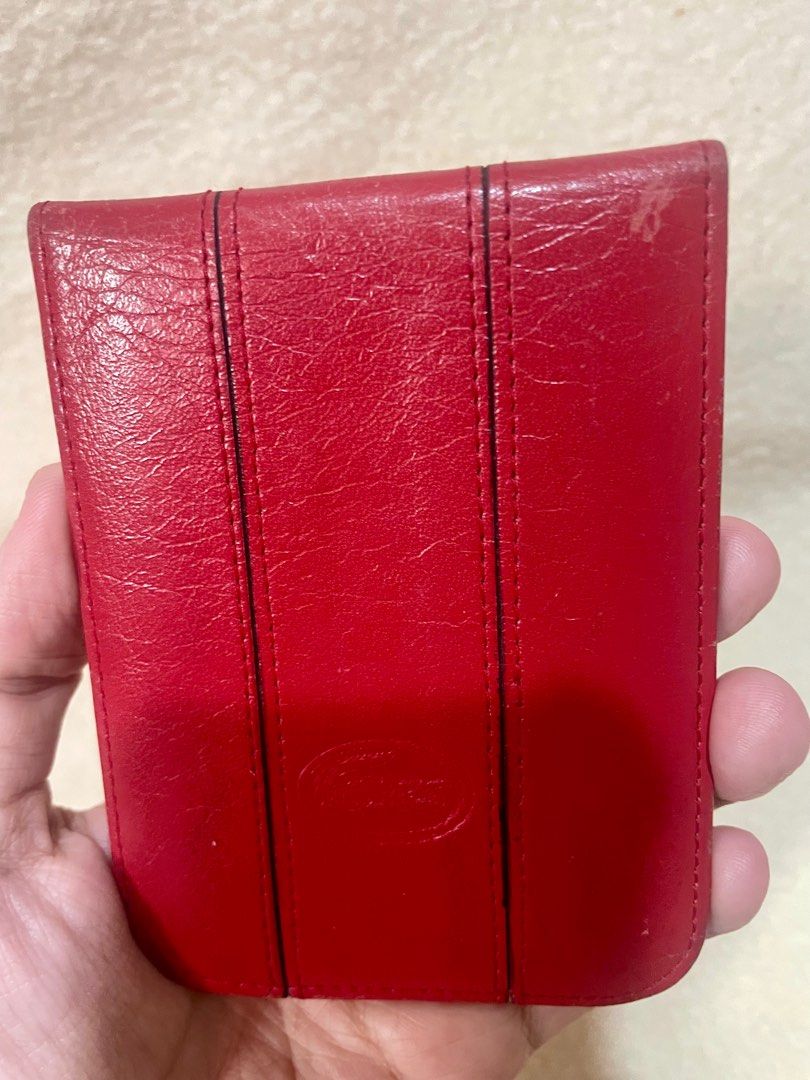 Lacoste leather cardholder (Category: Luxury Bags & Wallets) located in San Pablo. Submitted by prelovedbymistyblue (Listing ID 1304498487, Image 2). Description: Authentic vintage leather Pacoste card holder. With minimal rubs on the leather amd some signs of use on the leather. Selling low for 320. .