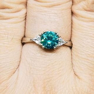 Moissanite ring. Blue-green color. Adjustable ring. AU750. 18k plated.