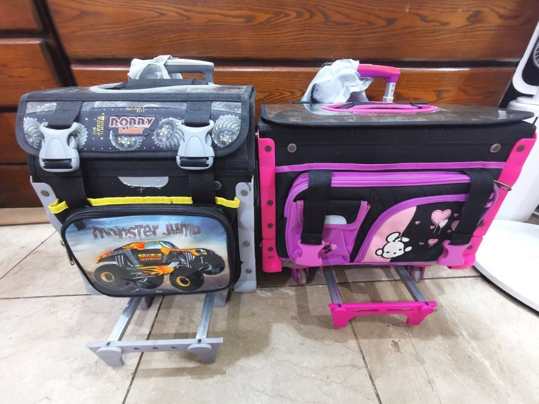 Robby Rabbit Monster Jump Stroller Bag (Category: Strollers) located in Bacoor. Submitted by ctrl_thrift_ (Listing ID 1304548034, Image 2). Description: Pre-loved Kids Stroller for Boys Design: Monster Jump Color: Black, gray, with yellow accents Location: Gen Tri, Cavite Details: Includes side bag pocket, rain cover, juicer holder Trolley handle with push-button (adjustable height) Bottom pull-out front support for balance & heavy loads Water-re