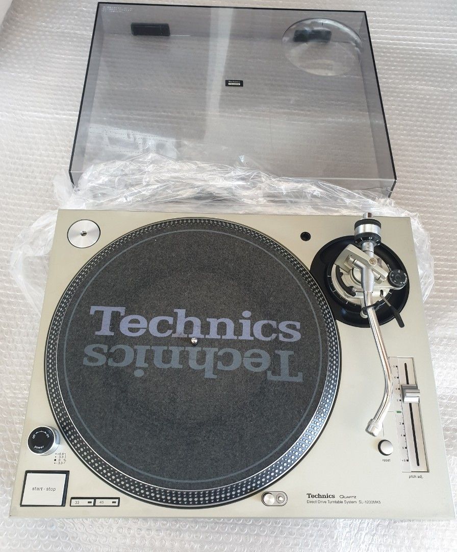 Technics SL-1200MK5 Turntable (Category: Soundbars, Speakers & Amplifiers) located in Manila. Submitted by racz03 (Listing ID 1304457627, Image 2). Description: New Arrival. No 2 Technics SL-1200MK5 Direct Drive Turntable. Body Appearance: Near Mint Condition, Makinis, Presentable. Tested, in Excellent Working Condition. It Comes With: Slipmat, Rubber Mat, 45 rpm Adapter, Dustcover & Auxiliary Weight, With Original High Fedelity Technics Rca Cord