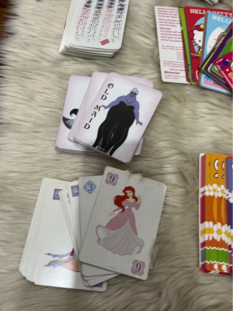 Assorted cards take all (Category: Raw Singles) located in Marikina City. Submitted by lay_away_ok (Listing ID 1304670291, Image 2). Description: Some are vintage Lucky 8 has 2 missing cards Go fish Old maid Miracle deck Sketchers Vintage islas canarias Monopoly Crazy eights .