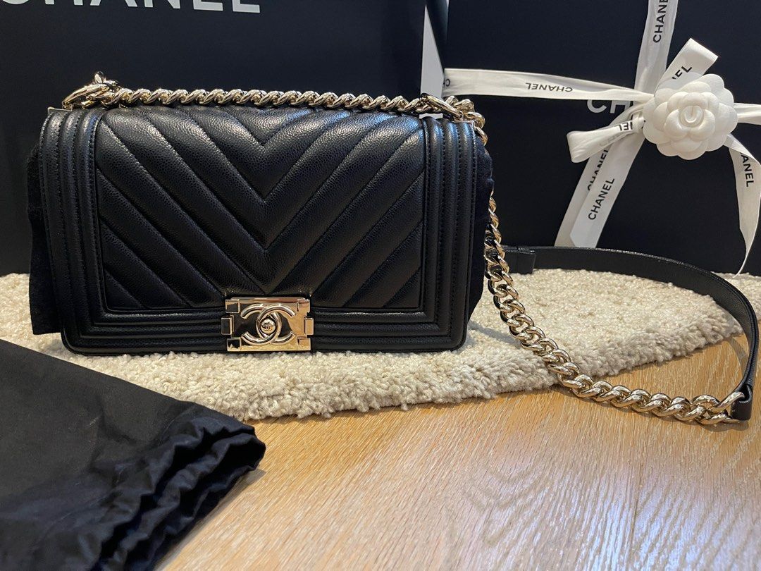 Chanel Boy handbag in Medium Black Caviar with light gold hardware