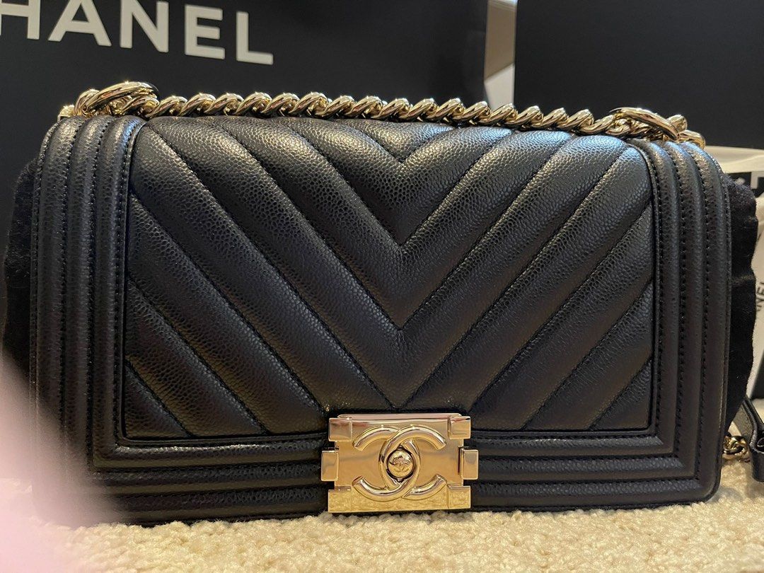 Chanel Boy handbag in Medium Black Caviar with light gold hardware