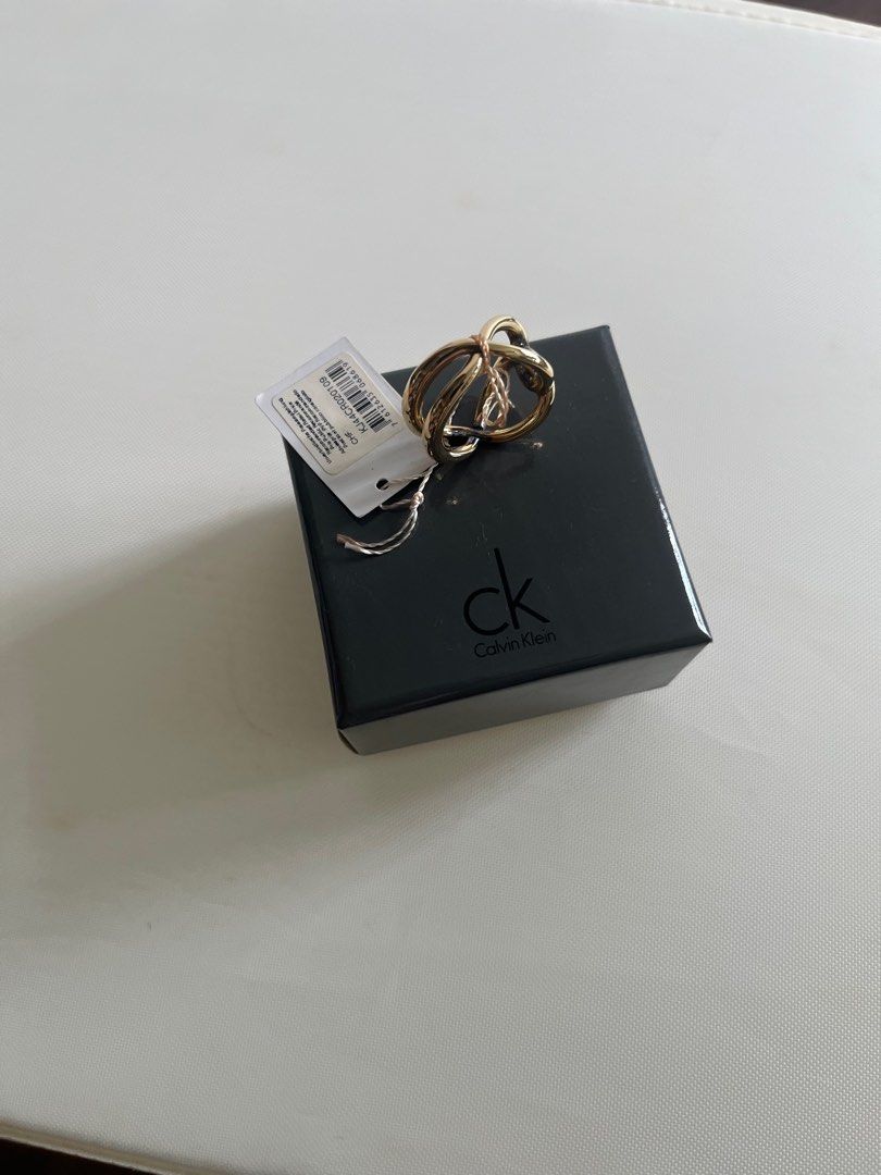 CK Infinity Ring (Category: Accessories) located in Singapore. Submitted by rayc31 (Listing ID 1304642695, Image 1). Description: Printed L9 on ring.