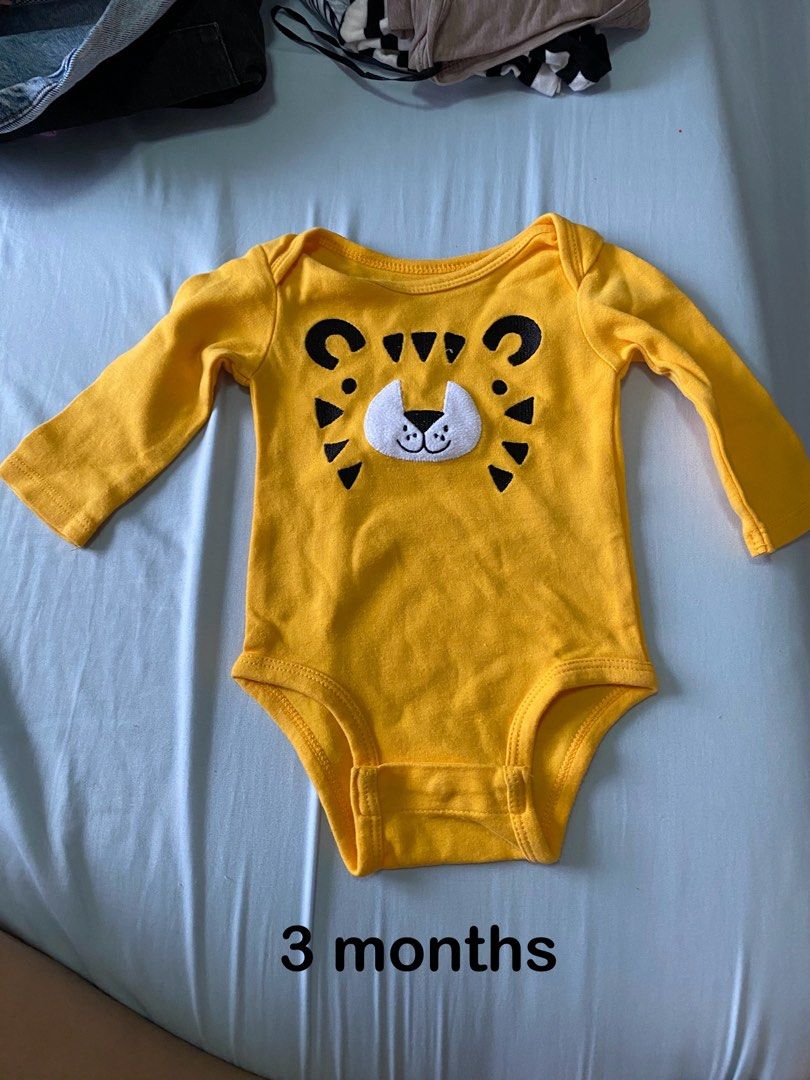 Newborn onesie (Category: Babies & Kids Fashion) located in Las Pinas. Submitted by ketshops (Listing ID 1304616429, Image 1). Description: 80 pesos each. In really good condition. Sizes are indicated below each photo.