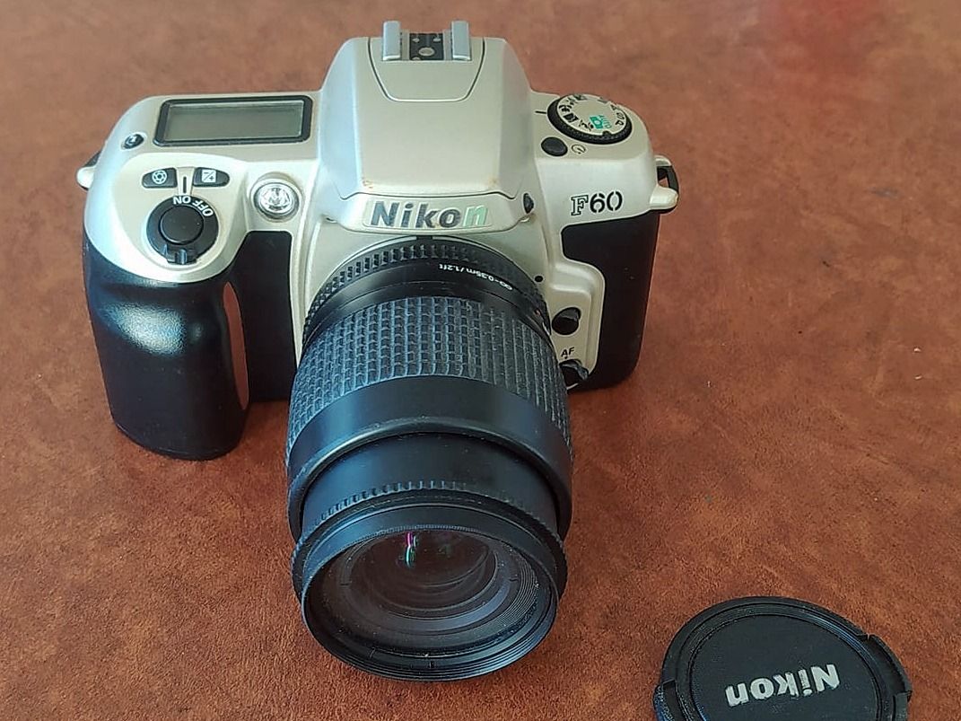Nikon Film Camera (Category: Cameras) located in Paranaque City. Submitted by juan_luma (Listing ID 1304707941, Image 1). Description: Nikon Film Camera Not using na, collecting dust Untested now but working before Selling as is condition.