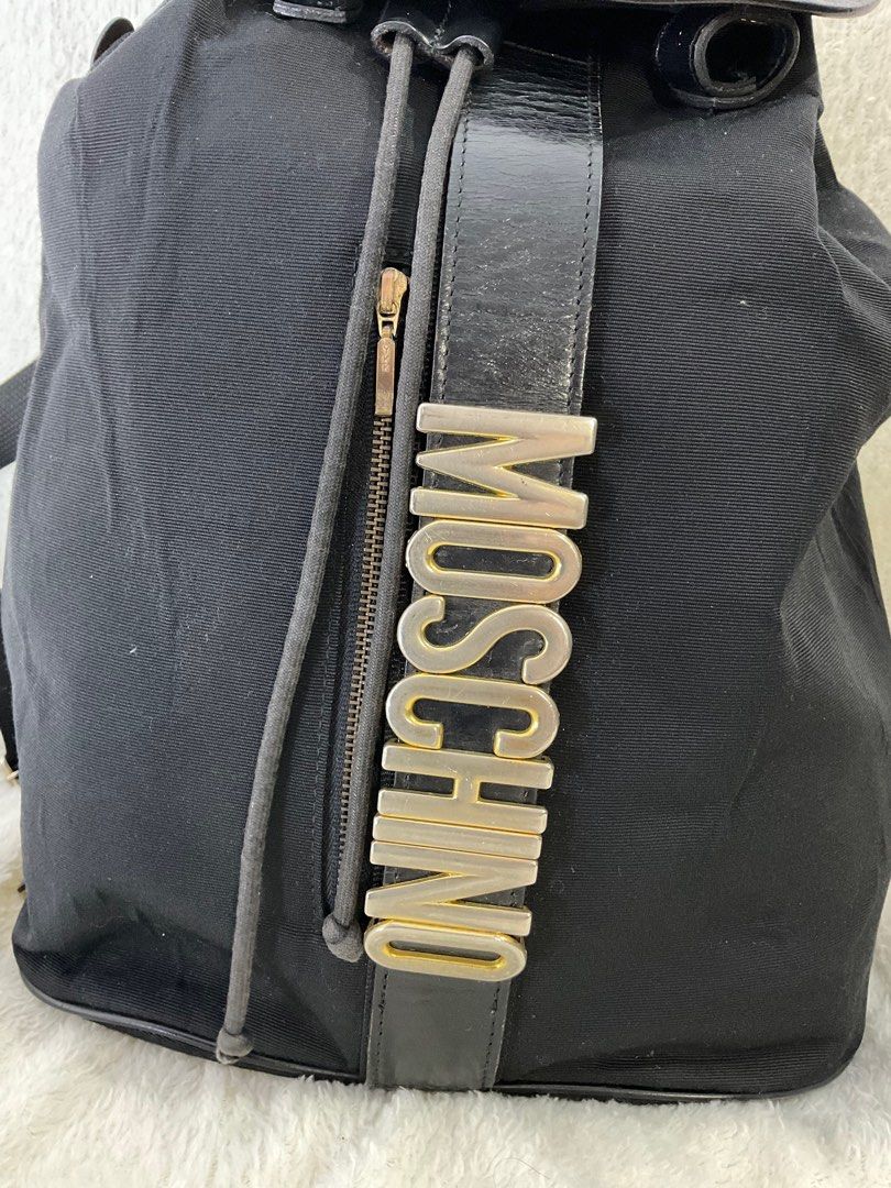 Vintage Moschino backpack (Category: Luxury Bags & Wallets) located in Caloocan City. Submitted by siftedthriftedph (Listing ID 1304645495, Image 2). Description: Authentic Vintage Moschino Bawal sa maselan Signs of use sa hardwares, some bubbles sa canvas medium size.