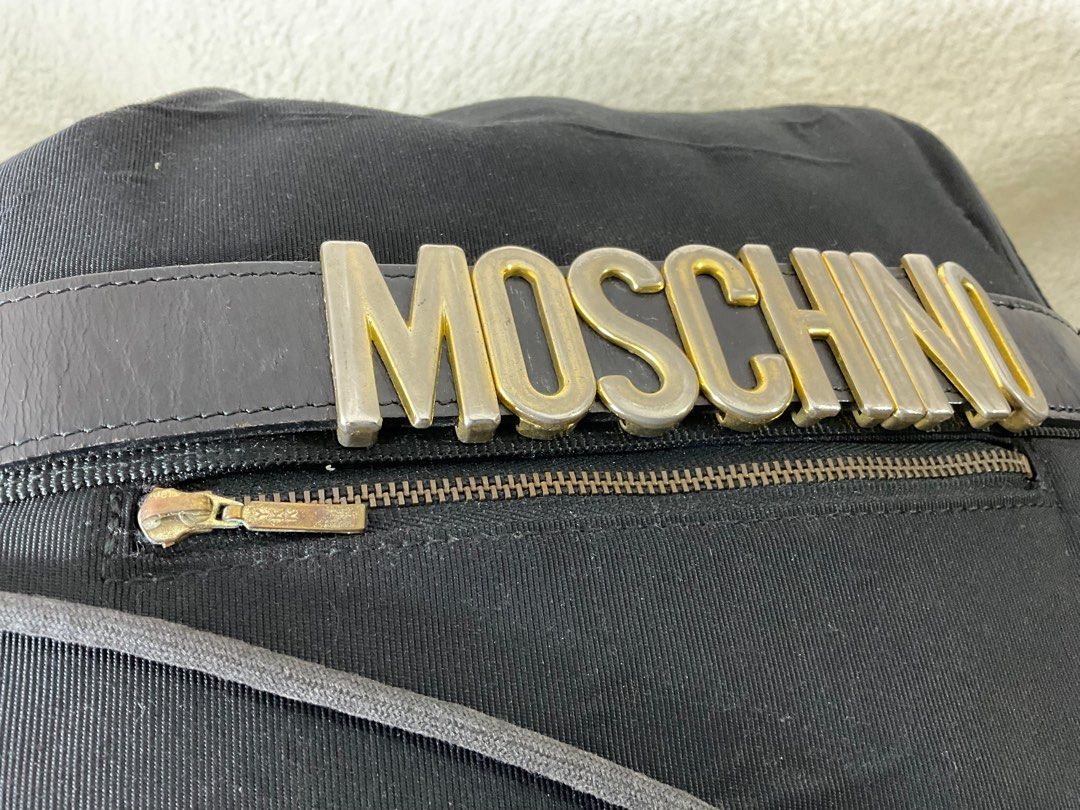 Vintage Moschino backpack (Category: Luxury Bags & Wallets) located in Caloocan City. Submitted by siftedthriftedph (Listing ID 1304645495, Image 3). Description: Authentic Vintage Moschino Bawal sa maselan Signs of use sa hardwares, some bubbles sa canvas medium size.