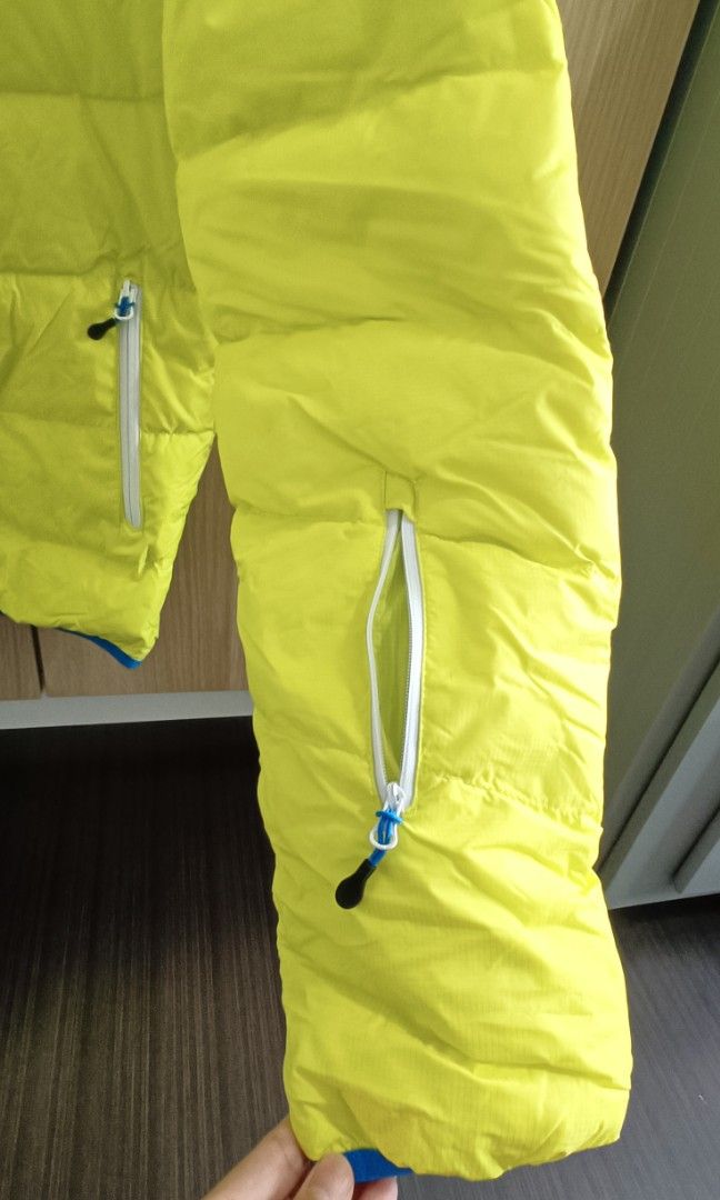 Winter Jacket (Category: Coats, Jackets and Outerwear) located in Singapore. Submitted by liwenchen84 (Listing ID 1304662793, Image 2). Description: yellow hooded ski jacket with sleeve pockets and blue inner lining..