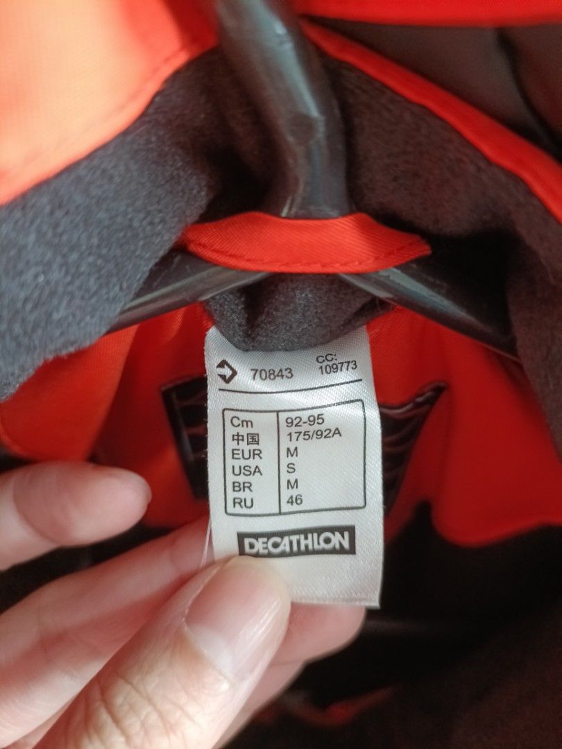Winter Jacket (Category: Coats, Jackets and Outerwear) located in Singapore. Submitted by liwenchen84 (Listing ID 1304663289, Image 2). Description: Bright orange ski jacket with black lining comes with lots of pockets and straps for adjustments.