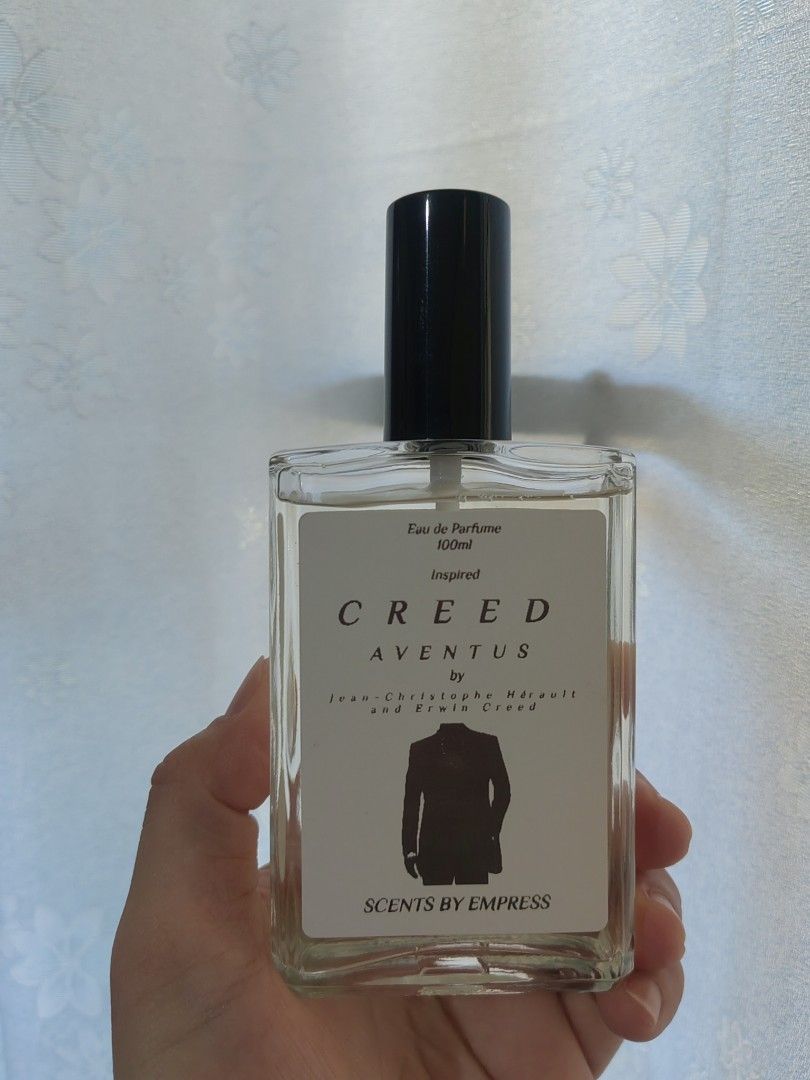 CREED AVENTUS 100ML OIL BASE PERFUME (Category: Fragrance & Deodorants) located in Taguig. Submitted by scentsbyempress (Listing ID 1304800892, Image 1). Description: Aventus by Creed is a Chypre Fruity fragrance for men. Aventus was launched in 2010. Aventus was created by Jean-Christophe Hérault and Erwin Creed. Top notes are Bergamot, Black Currant, Apple, Lemon and Pink Pepper; middle notes are Pineapple, Patchouli and Moroccan Jasmine; base 