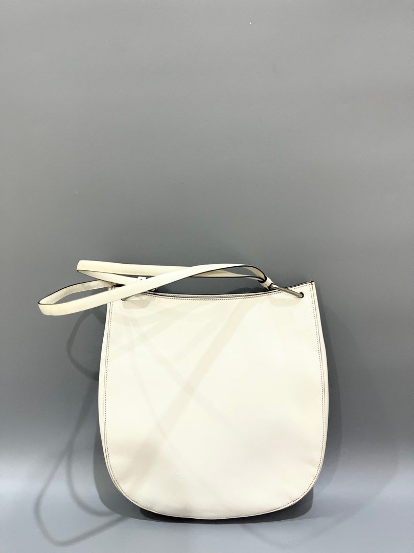 Prada (Category: Luxury Bags & Wallets) located in Manila. Submitted by luvluxe.mnl (Listing ID 1304804365, Image 3). Description: Authentic vintage Small to semi medium size In good condition.