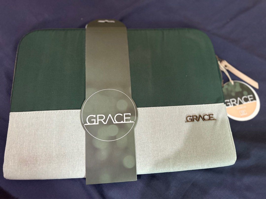 STM Grace Laptop Sleeve 13”-14” (Category: Laptop Bags & Sleeves) located in Macabebe. Submitted by omochayaph (Listing ID 1304855479, Image 2). Description: Condition: Brand New with tag Color: Hunter Green Dimensions: 34.5 x 2.5 x 25.5 cm; 180 g Fits most 13” screens and 14” MacBook Pro.
