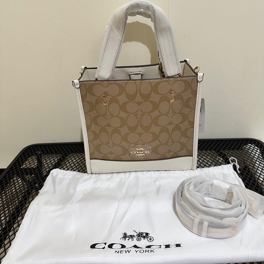 Coach Dempsey Tote Signature (Category: Luxury Bags & Wallets) located in Makati City. Submitted by lux.mariah (Listing ID 1305057619, Image 1). Description: 💯 Guaranteed authentic 2 way bag Brand new Complete Inclusions Courier: J&t /Lalamove/ LBC Mop: Gcash / Bank Transfer/ Maya.