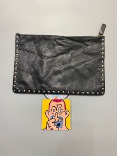 gianni vallenito studded clutch bag