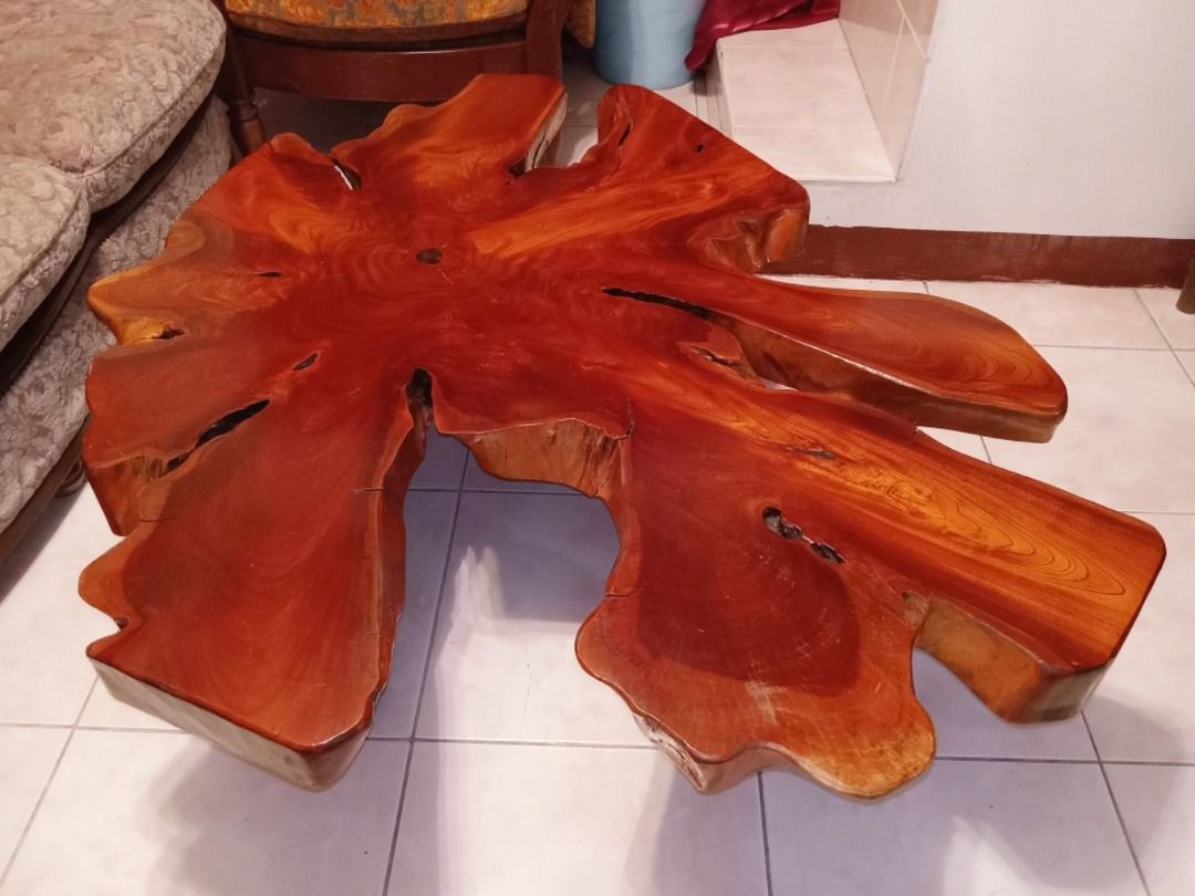 Live Edge Coffee Table with Rustic Character, Vintage (Category: Tables & Sets) located in Dasmarinas. Submitted by jamricana137 (Listing ID 1305105270, Image 1). Description: This exquisite vintage live edge wood coffee table exudes a rustic charm and natural elegance that effortlessly enhances any interior space. The table's live edge design showcases the natural contours and unique grain patterns of the wood. This creates a striking and one-of