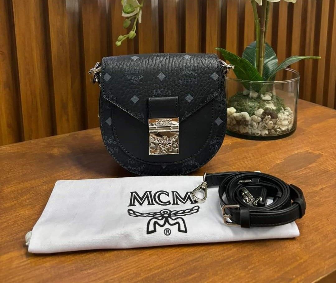 MCM Patricia Mini Saddle Bag Condition 9 10 Comes with Dustbag and Strap 18K FIXED PRICE Women s Fashion Bags Wallets Cross body Bags on Carousell