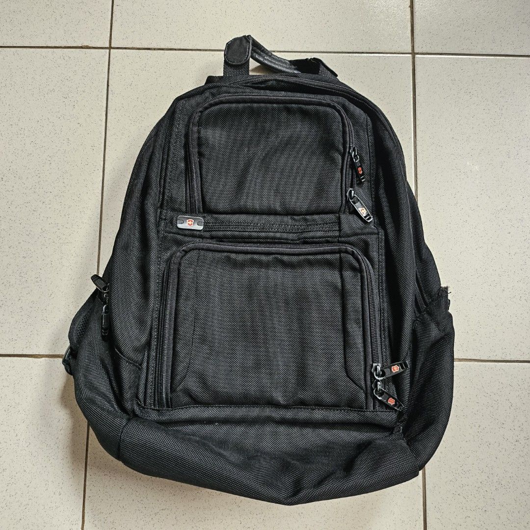original Victorinox black laptop backpack bag (Category: Backpacks) located in Muntinlupa City. Submitted by .mrrssllzr (Listing ID 1305067920, Image 1). Description: flaws: - minimal signs of use - see photo of top main zippers - minor stains inside but does not look too awful, not sure if can be washed but i believe yes see last photo for measurements when laid flat.