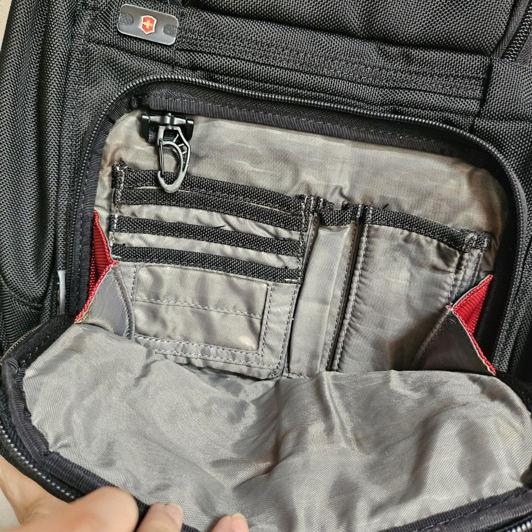 original Victorinox black laptop backpack bag (Category: Backpacks) located in Muntinlupa City. Submitted by .mrrssllzr (Listing ID 1305067920, Image 3). Description: flaws: - minimal signs of use - see photo of top main zippers - minor stains inside but does not look too awful, not sure if can be washed but i believe yes see last photo for measurements when laid flat.