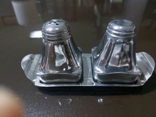Stainless salt and pepper shaker with tray